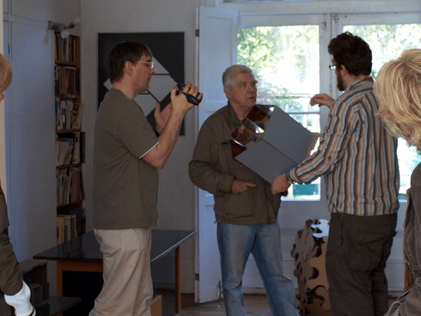 Being interviewed by Peter Lowe about hyperbolic geometry. 